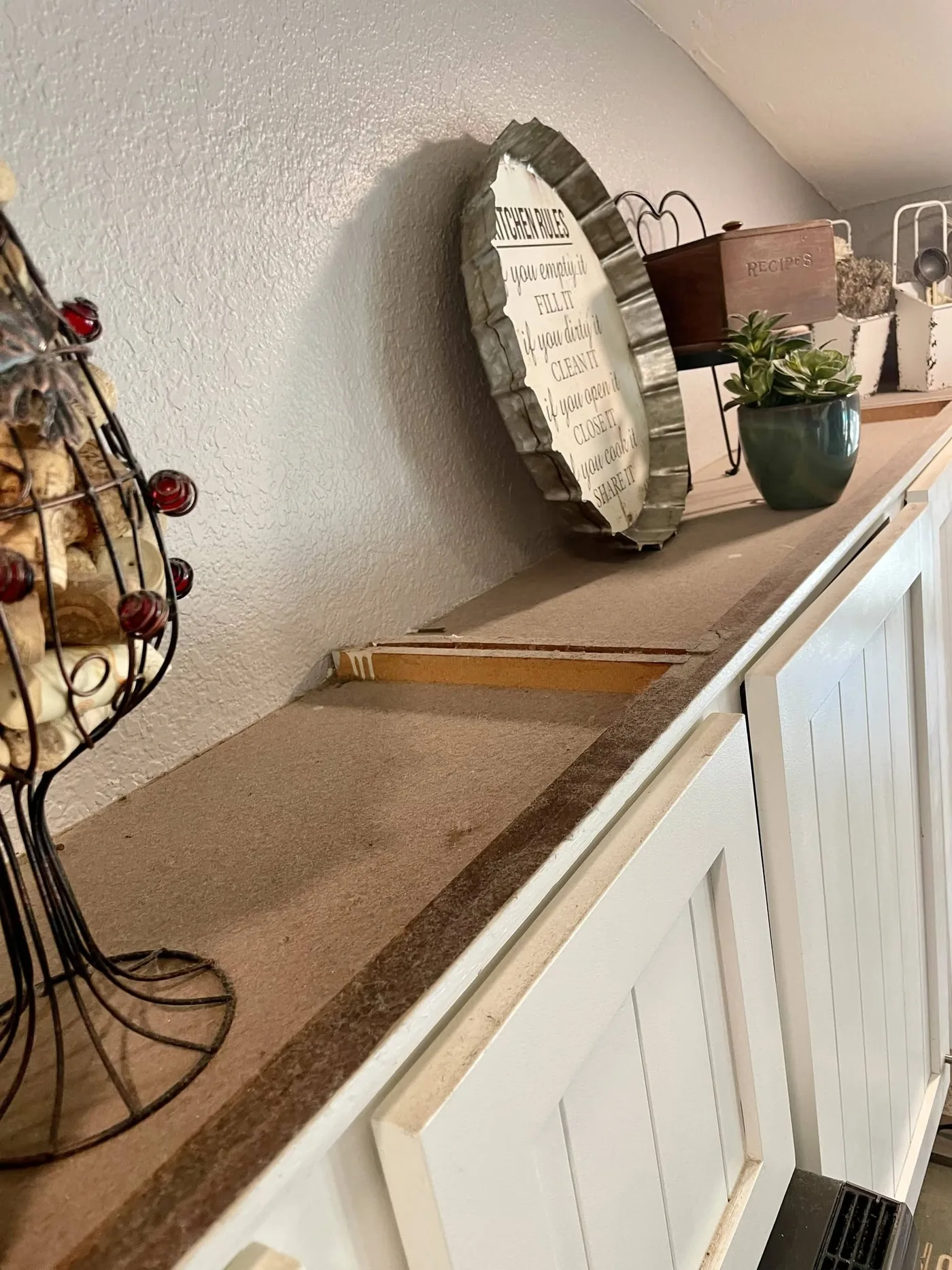 Detailed cabinet top cleaning area